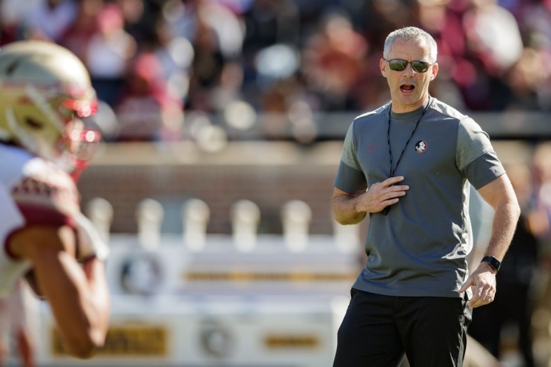 Florida State Seminoles head coach Mike Norvell conducts warm-ups in Doak Campbell Stadium before the Garnet and Gold spring game kickoff Saturday, April 9, 2022.

Fsu Spring Game155