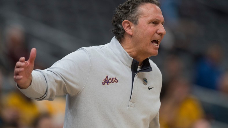 Evansville Head Coach Todd Lickliter calls out to the referees as the University of Evansville Purple Aces play the Valparaiso University Beacons during the Missouri Valley Conference Tournament at the Enterprise Center in St. Louis, MO., Thursday, March 3, 2022. The No. 10 Evansville Purple Aces fell to the No. 7 Valparaiso Beacons,  81-59.

1 LICKLITER