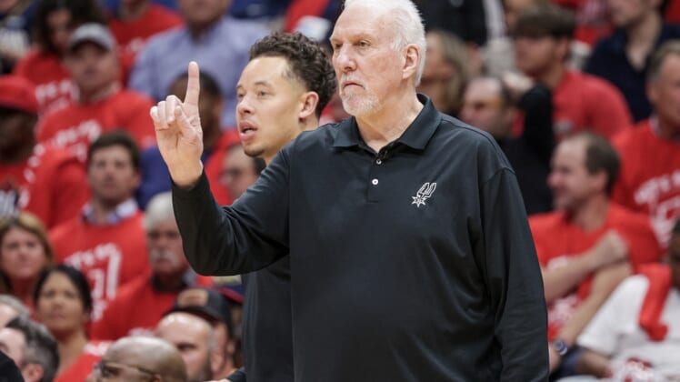 Apr 13, 2022; New Orleans, Louisiana, USA; San Antonio Spurs head coach Gregg Popovich reacts to a play against the New Orleans Pelicans during the first half of a play-in playoff game at the Smoothie King Center. Mandatory Credit: Stephen Lew-USA TODAY Sports