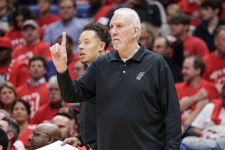 Apr 13, 2022; New Orleans, Louisiana, USA; San Antonio Spurs head coach Gregg Popovich reacts to a play against the New Orleans Pelicans during the first half of a play-in playoff game at the Smoothie King Center. Mandatory Credit: Stephen Lew-USA TODAY Sports