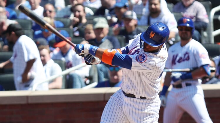 Mets Robinson Cano hits a solo home run against the Diamondbacks during baseball action at Citi Field in Queens, New York April 15, 2022.Mets Home Opener