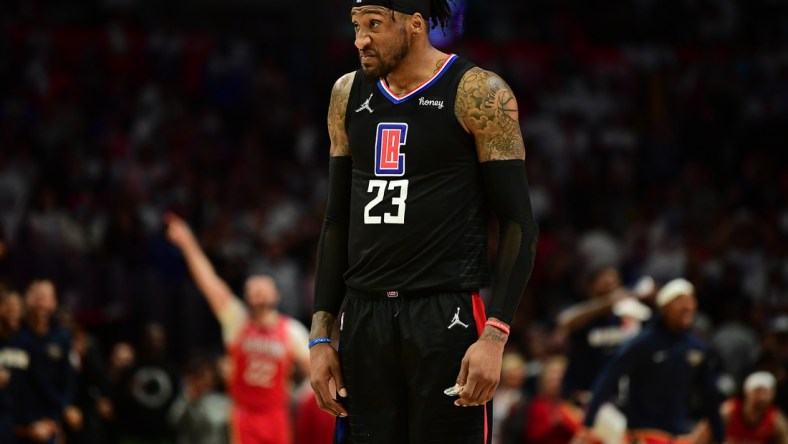 Apr 15, 2022; Los Angeles, California, USA; Los Angeles Clippers forward Robert Covington (23) reacts following the loss against the New Orleans Pelicans in the play in game at Crypto.com Arena. Mandatory Credit: Gary A. Vasquez-USA TODAY Sports