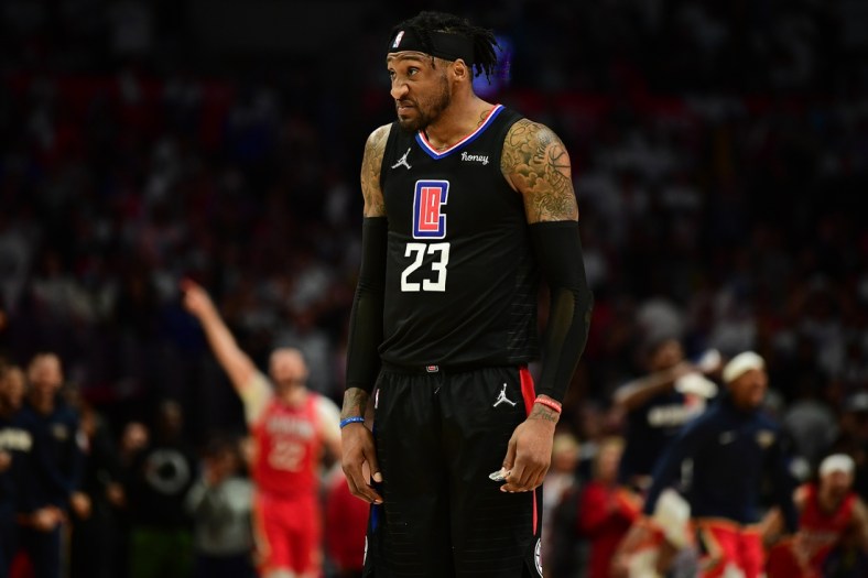 Apr 15, 2022; Los Angeles, California, USA; Los Angeles Clippers forward Robert Covington (23) reacts following the loss against the New Orleans Pelicans in the play in game at Crypto.com Arena. Mandatory Credit: Gary A. Vasquez-USA TODAY Sports