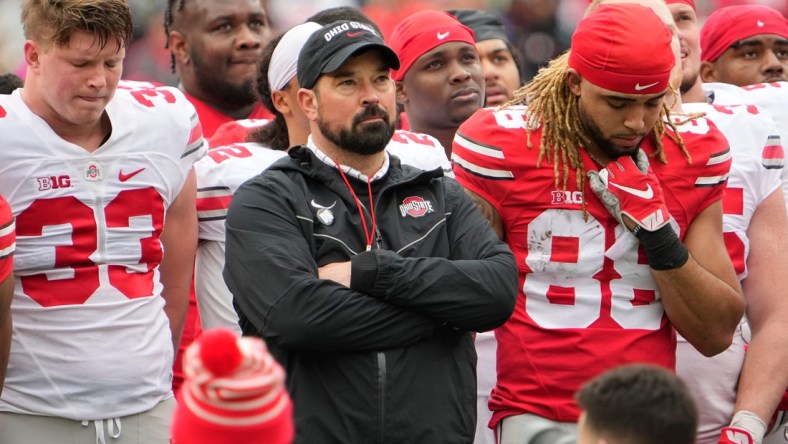 Ohio State Buckeyes head coach Ryan Day and players stand at midfield for a tribute to Dwayne Haskins during the spring football game at Ohio Stadium in Columbus on April 16, 2022.

Ncaa Football Ohio State Spring Game