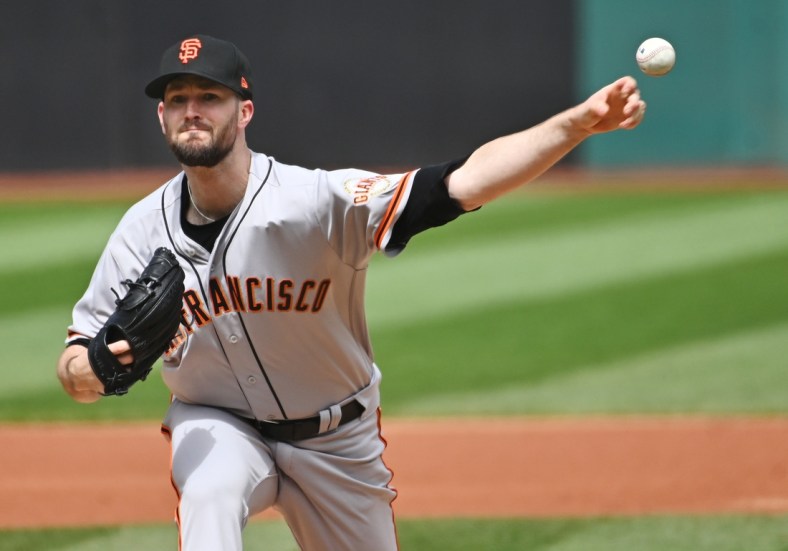Apr 17, 2022; Cleveland, Ohio, USA; San Francisco Giants starting pitcher Alex Wood (57) throws a pitch during the first inning against the Cleveland Guardians at Progressive Field. Mandatory Credit: Ken Blaze-USA TODAY Sports