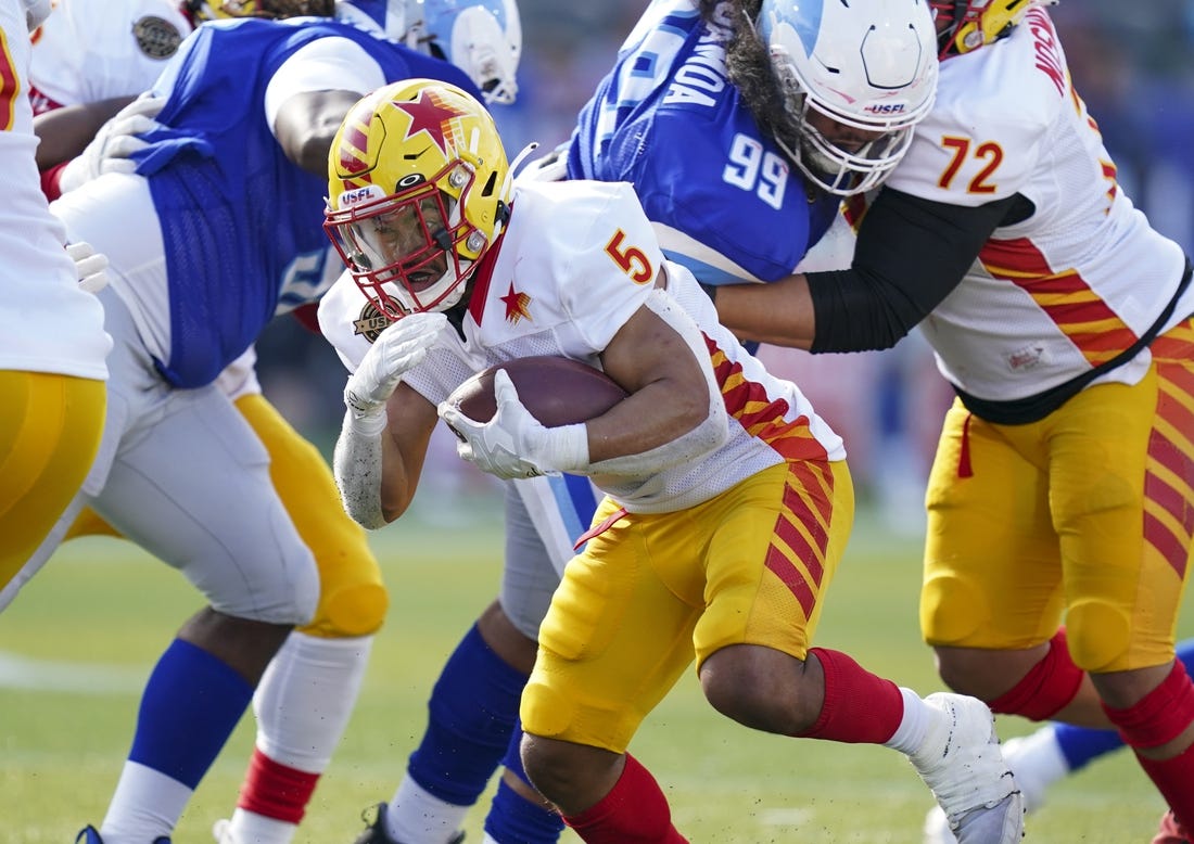 Apr 17, 2022; Birmingham, AL, USA; Philadelphia Stars running back Matt Colburn II (5) carries the ball against New Orleans Breakers during the first half at Protective Stadium. Mandatory Credit: Marvin Gentry-USA TODAY Sports