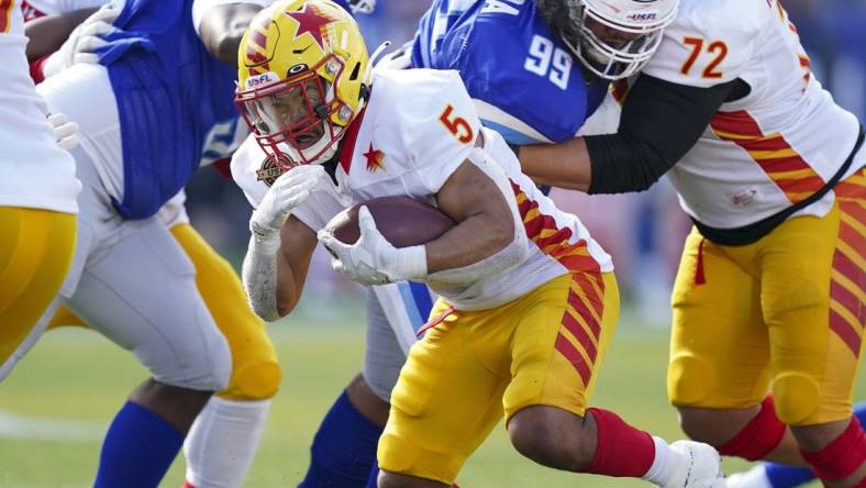 Apr 17, 2022; Birmingham, AL, USA; Philadelphia Stars running back Matt Colburn II (5) carries the ball against New Orleans Breakers during the first half at Protective Stadium. Mandatory Credit: Marvin Gentry-USA TODAY Sports