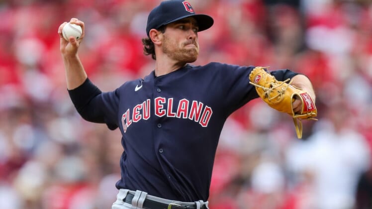 Apr 12, 2022; Cincinnati, Ohio, USA; Cleveland Guardians starting pitcher Shane Bieber (57) throws a pitch against the Cincinnati Reds in the first inning at Great American Ball Park. Mandatory Credit: Katie Stratman-USA TODAY Sports