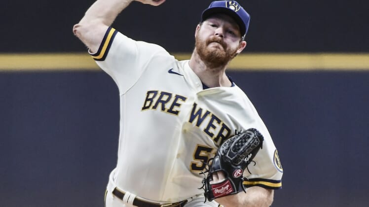 Apr 20, 2022; Milwaukee, Wisconsin, USA;  Milwaukee Brewers pitcher Brandon Woodruff (53) throws a pitch in the first inning during game against the Pittsburgh Pirates at American Family Field. Mandatory Credit: Benny Sieu-USA TODAY Sports