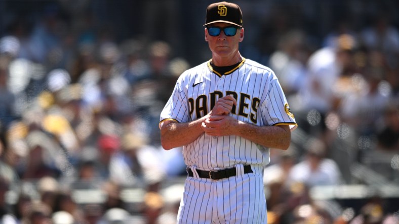 Apr 20, 2022; San Diego, California, USA; San Diego Padres manager Bob Melvin looks on during the fifth inning against the Cincinnati Reds at Petco Park. Mandatory Credit: Orlando Ramirez-USA TODAY Sports