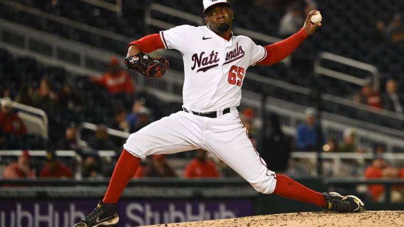 Apr 20, 2022; Washington, District of Columbia, USA;  Washington Nationals relief pitcher Francisco Perez (65) delivers a fourth inning pitch against the Arizona Diamondbacks at Nationals Park. Mandatory Credit: Tommy Gilligan-USA TODAY Sports