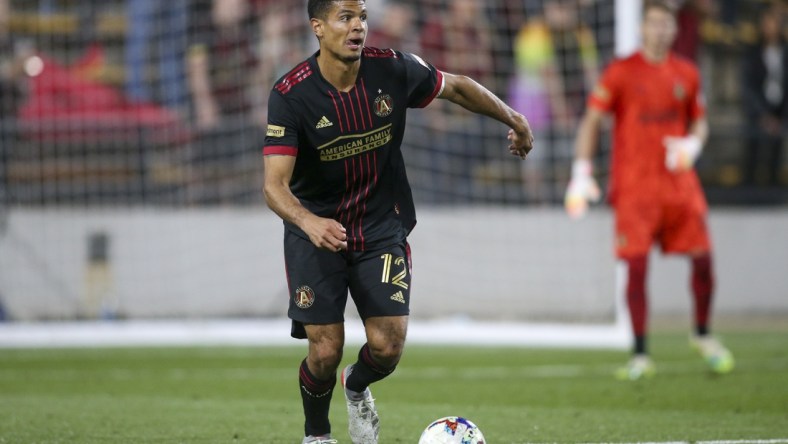 Apr 20, 2022; Kennesaw, Georgia, USA; Atlanta United defender Miles Robinson (12) dribbles against Chattanooga FC in the second half at Fifth Third Bank Stadium. Mandatory Credit: Brett Davis-USA TODAY Sports