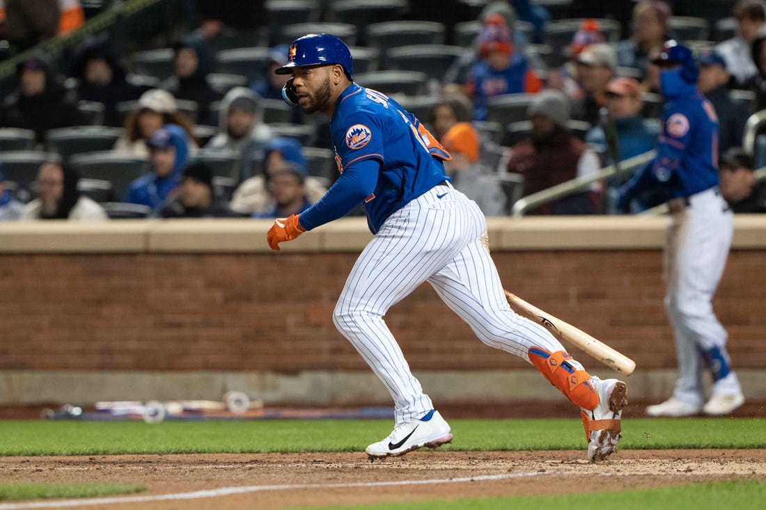 Apr 19, 2022; New York City, New York, USA; New York Mets left fielder Dominic Smith (2) hits a single against the San Francisco Giants during the sixth inning at Citi Field. Mandatory Credit: Gregory Fisher-USA TODAY Sports