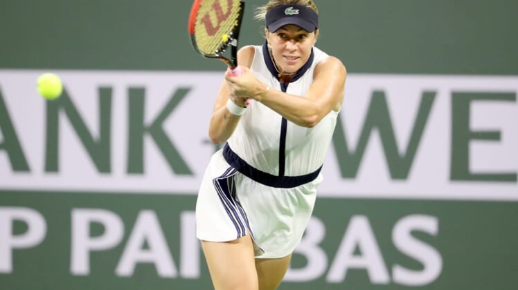 Anastasia Pavlyuchenkova of Russia returns a shot to Leylah Fernandez of Canada during the BNP Paribas Open in Indian Wells, Calif., on October 10, 2021.Syndication Desert Sun
