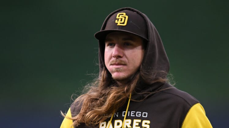 Apr 22, 2022; San Diego, California, USA; San Diego Padres starting pitcher Mike Clevinger (52) looks on before the game against the Los Angeles Dodgers at Petco Park. Mandatory Credit: Orlando Ramirez-USA TODAY Sports