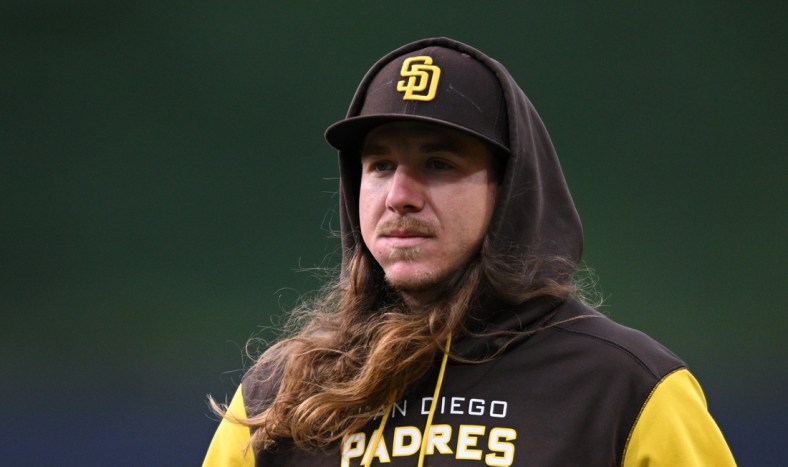 Apr 22, 2022; San Diego, California, USA; San Diego Padres starting pitcher Mike Clevinger (52) looks on before the game against the Los Angeles Dodgers at Petco Park. Mandatory Credit: Orlando Ramirez-USA TODAY Sports