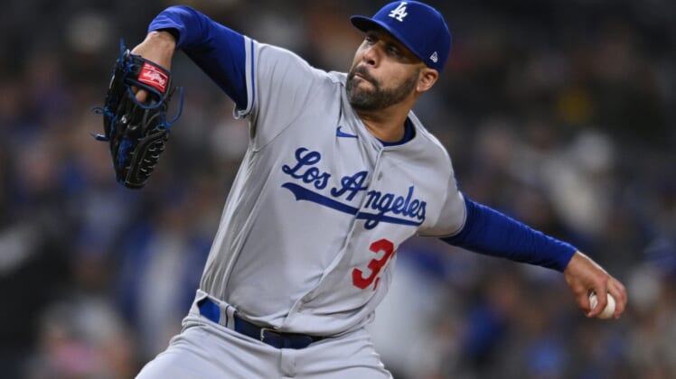 Apr 22, 2022; San Diego, California, USA; Los Angeles Dodgers relief pitcher David Price (33) throws a pitch against the San Diego Padres during the ninth inning at Petco Park. Mandatory Credit: Orlando Ramirez-USA TODAY Sports