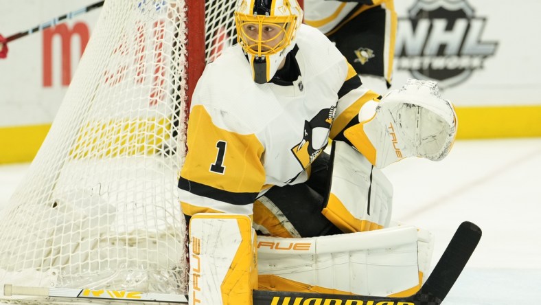 Apr 23, 2022; Detroit, Michigan, USA; Pittsburgh Penguins goaltender Casey DeSmith (1) protects the net during the second period against the Detroit Red Wings at Little Caesars Arena. Mandatory Credit: Raj Mehta-USA TODAY Sports