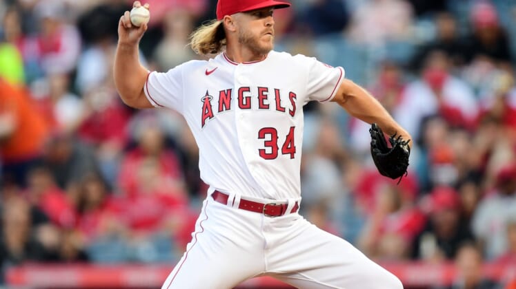 Apr 23, 2022; Anaheim, California, USA; Los Angeles Angels starting pitcher Noah Syndergaard (34) throws against the Baltimore Orioles during the first inning at Angel Stadium. Mandatory Credit: Gary A. Vasquez-USA TODAY Sports