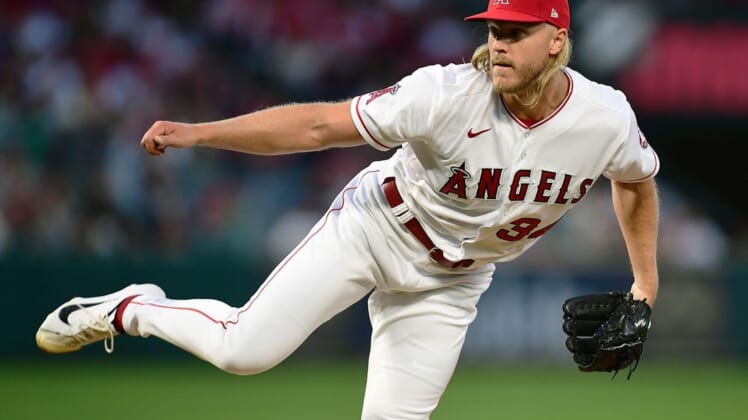 Apr 23, 2022; Anaheim, California, USA; Los Angeles Angels starting pitcher Noah Syndergaard (34) throws against the Baltimore Orioles during the fifth inning at Angel Stadium. Mandatory Credit: Gary A. Vasquez-USA TODAY Sports
