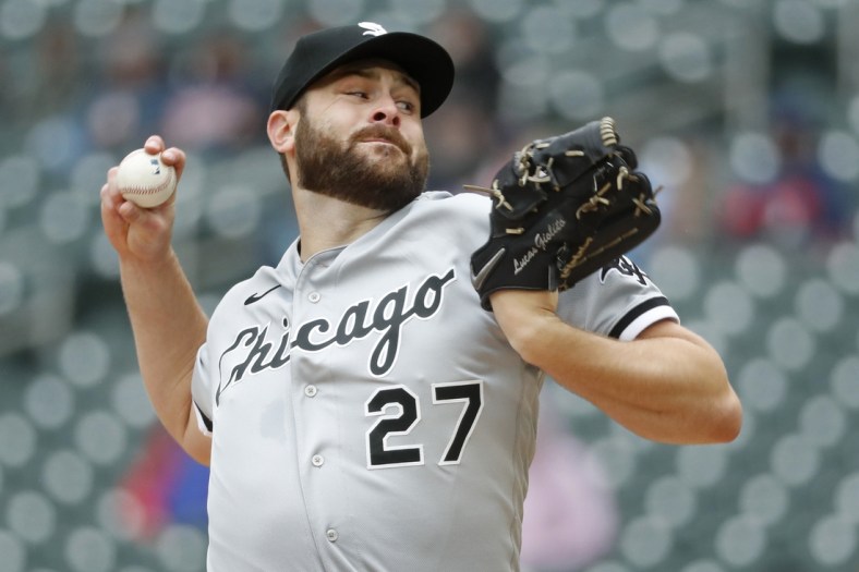 Apr 24, 2022; Minneapolis, Minnesota, USA; Chicago White Sox starting pitcher Lucas Giolito (27) throws to the Minnesota Twins in the first inning at Target Field. Mandatory Credit: Bruce Kluckhohn-USA TODAY Sports