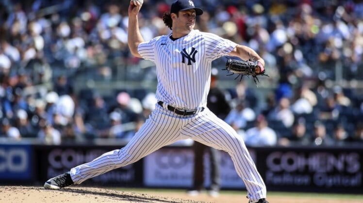 Apr 24, 2022; Bronx, New York, USA; New York Yankees starting pitcher Gerrit Cole (45) pitches in the fifth inning against the Cleveland Guardians at Yankee Stadium. Mandatory Credit: Wendell Cruz-USA TODAY Sports
