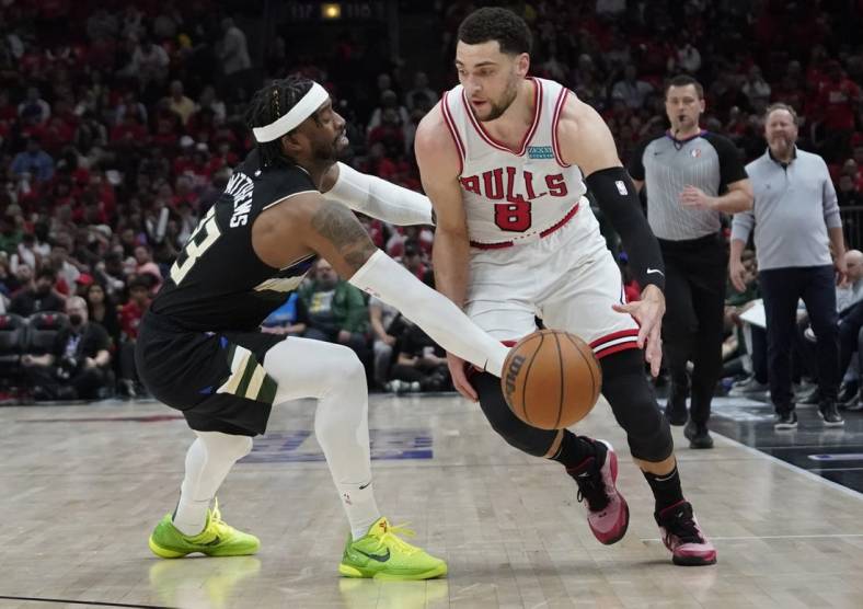 Apr 24, 2022; Chicago, Illinois, USA; Milwaukee Bucks guard Wesley Matthews (23) defends Chicago Bulls guard Zach LaVine (8) in the second half during game four of the first round for the 2022 NBA playoffs at United Center. Mandatory Credit: David Banks-USA TODAY Sports