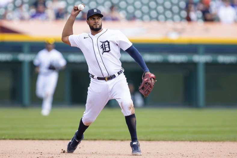 Apr 24, 2022; Detroit, Michigan, USA; Detroit Tigers third baseman Jeimer Candelario (46) makes a throw to first base for an out during the ninth inning against the Colorado Rockies at Comerica Park. Mandatory Credit: Raj Mehta-USA TODAY Sports