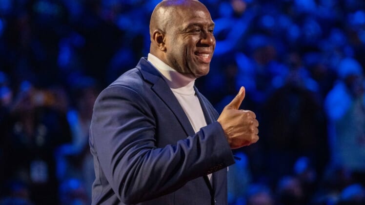 February 20, 2022; Cleveland, Ohio, USA; NBA great Magic Johnson is honored for being selected to the NBA 75th Anniversary Team during halftime in the 2022 NBA All-Star Game at Rocket Mortgage FieldHouse. Mandatory Credit: Kyle Terada-USA TODAY Sports