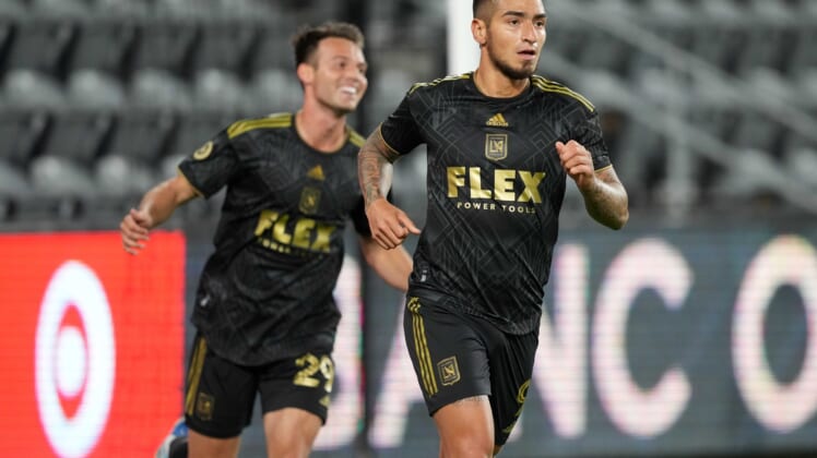 Apr 20, 2022; Los Angeles, California, USA; LAFC forward Cristian Arango (9) and forward Danny Musovski (29) celebrate after a goal against the Orange County SC in the first half at Banc of California Stadium. Mandatory Credit: Kirby Lee-USA TODAY Sports