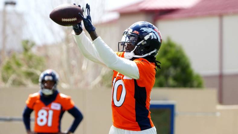 Apr 25, 2022; Englewood, CO, USA; Denver Broncos wide receiver Jerry Jeudy (10) works out during a Denver Broncos mini camp at UCHealth Training Center. Mandatory Credit: Ron Chenoy-USA TODAY Sports