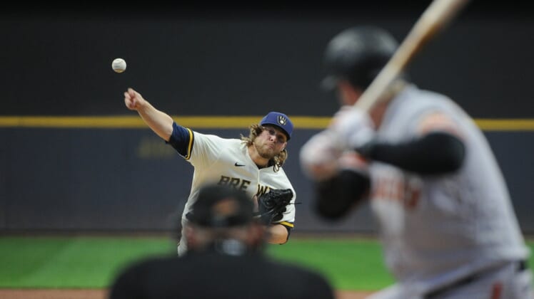 Apr 25, 2022; Milwaukee, Wisconsin, USA; Milwaukee Brewers starting pitcher Corbin Burnes (39) throws in the first inning against the San Francisco Giants at American Family Field. Mandatory Credit: Michael McLoone-USA TODAY Sports