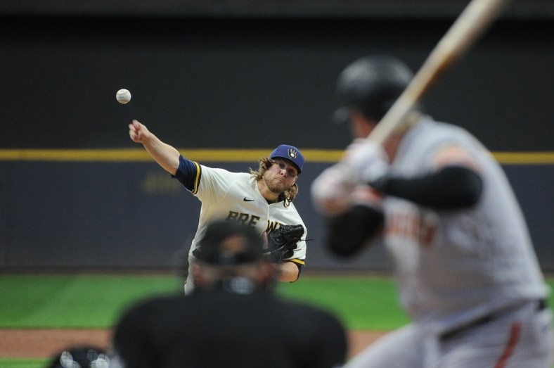 Apr 25, 2022; Milwaukee, Wisconsin, USA; Milwaukee Brewers starting pitcher Corbin Burnes (39) throws in the first inning against the San Francisco Giants at American Family Field. Mandatory Credit: Michael McLoone-USA TODAY Sports