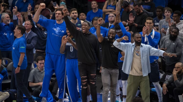 Apr 25, 2022; Dallas, Texas, USA; The Dallas Mavericks bench celebrates during the fourth quarter against the Utah Jazz in game five of the first round for the 2022 NBA playoffs at American Airlines Center. Mandatory Credit: Jerome Miron-USA TODAY Sports