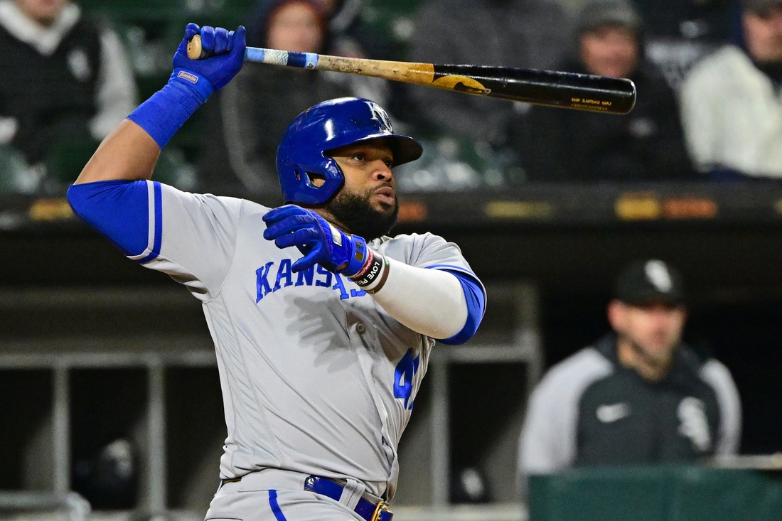 Apr 26, 2022; Chicago, Illinois, USA; Kansas City Royals first baseman Carlos Santana (41) hits a two run single in the sixth inning against the Chicago White Sox at Guaranteed Rate Field. Mandatory Credit: Quinn Harris-USA TODAY Sports