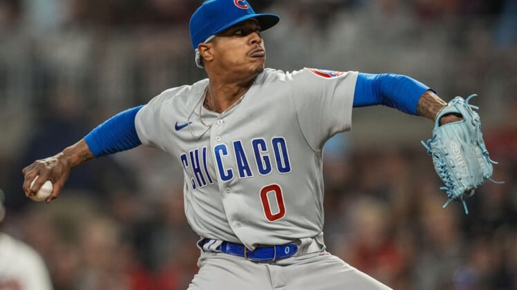 Apr 26, 2022; Cumberland, Georgia, USA; Chicago Cubs starting pitcher Marcus Stroman (0) pitches against the Atlanta Braves during the fifth inning at Truist Park. Mandatory Credit: Dale Zanine-USA TODAY Sports
