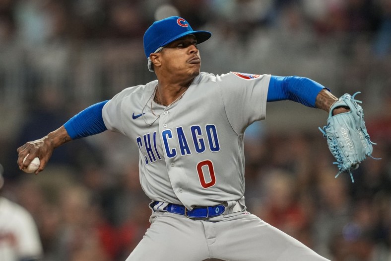 Apr 26, 2022; Cumberland, Georgia, USA; Chicago Cubs starting pitcher Marcus Stroman (0) pitches against the Atlanta Braves during the fifth inning at Truist Park. Mandatory Credit: Dale Zanine-USA TODAY Sports
