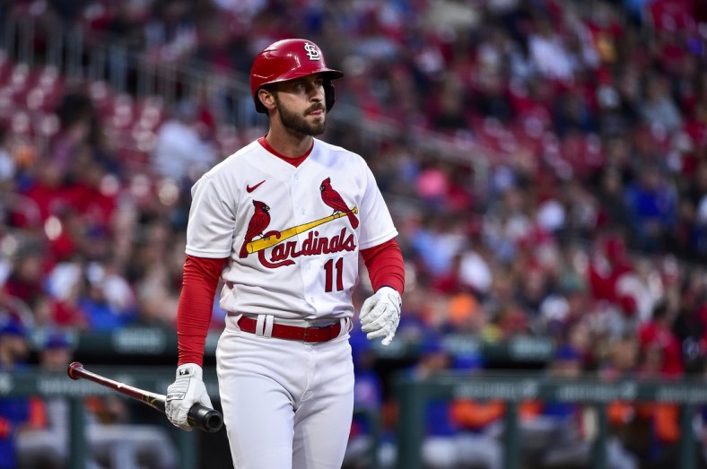 Apr 26, 2022; St. Louis, Missouri, USA;  St. Louis Cardinals shortstop Paul DeJong (11) walks back to the dugout after striking out against the New York Mets during the second inning at Busch Stadium. Mandatory Credit: Jeff Curry-USA TODAY Sports