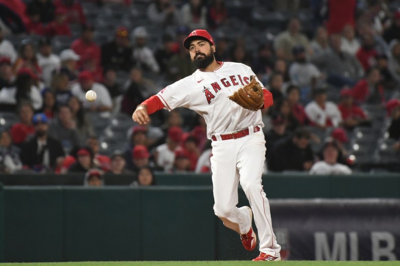 Apr 27, 2022; Anaheim, California, USA; Los Angeles Angels third baseman Anthony Rendon (6) throws to first for an out in the top of the eighth inning against the Cleveland Guardians at Angel Stadium. Mandatory Credit: Richard Mackson-USA TODAY Sports