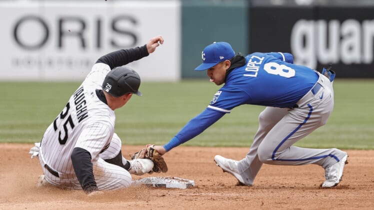 Apr 28, 2022; Chicago, Illinois, USA; Kansas City Royals second baseman Nicky Lopez (8) tags out Chicago White Sox designated hitter Andrew Vaughn (25) at second base during the fourth inning at Guaranteed Rate Field. Mandatory Credit: Kamil Krzaczynski-USA TODAY Sports
