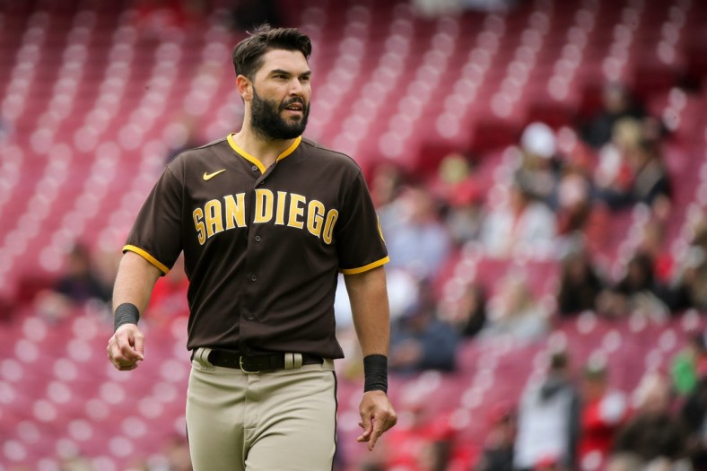 San Diego Padres first baseman Eric Hosmer (30) walks back to the dugout after the first inning hits of a baseball game against the San Diego Padres, Thursday, April 28, 2022, at Great American Ball Park in Cincinnati.