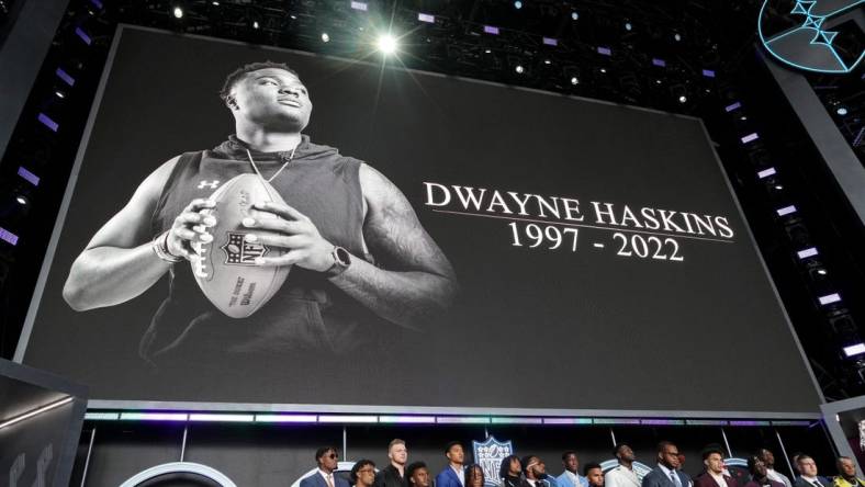 Apr 28, 2022; Las Vegas, NV, USA; A moment of silence is held for Dwayne Haskins before the first round of the 2022 NFL Draft at the NFL Draft Theater. Mandatory Credit: Kirby Lee-USA TODAY Sports