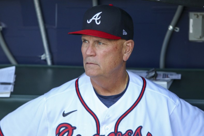Apr 28, 2022; Atlanta, Georgia, USA; Atlanta Braves manager Brian Snitker (43) in the dugout before a game against the Chicago Cubs at Truist Park. Mandatory Credit: Brett Davis-USA TODAY Sports