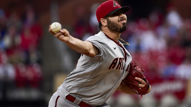 Apr 28, 2022; St. Louis, Missouri, USA;  Arizona Diamondbacks starting pitcher Humberto Castellanos (54) pitches against the St. Louis Cardinals during the first inning at Busch Stadium. Mandatory Credit: Jeff Curry-USA TODAY Sports