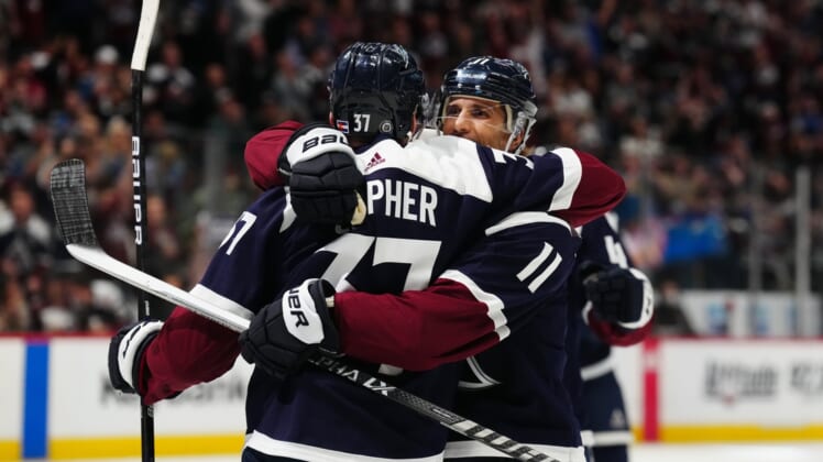 Apr 28, 2022; Denver, Colorado, USA; Colorado Avalanche left wing J.T. Compher (37) celebrates his goal with center Andrew Cogliano (11) in the second period against the Nashville Predators at Ball Arena. Mandatory Credit: Ron Chenoy-USA TODAY Sports