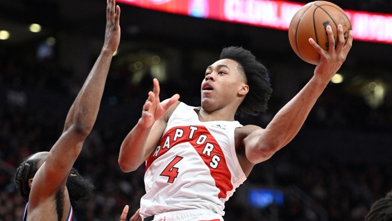 Apr 28, 2022; Toronto, Ontario, CAN;  Toronto Raptors forward Scottie Barnes (4) shoots the ball against the Philadelphia 76ers in the second half during game six of the first round for the 2022 NBA playoffs at Scotiabank Arena. Mandatory Credit: Dan Hamilton-USA TODAY Sports