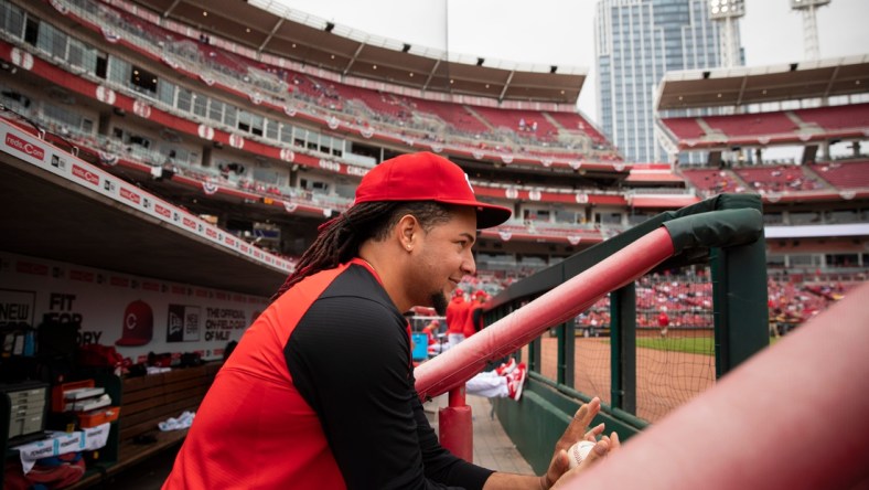 Cincinnati Reds pitcher Luis Castillo, who is on the injured list, watches the baseball game against the San Diego Padres, Thursday, April 28, 2022, at Great American Ball Park in Cincinnati.