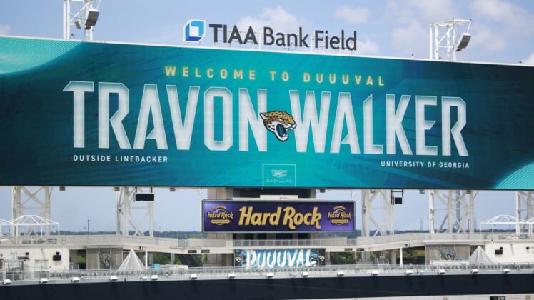 The scoreboard welcomes Jacksonville Jaguars first round draft pick Travon Walker after a press conference Friday, April 29, 2022 at TIAA Bank Field in Jacksonville. Walker, a defensive lineman from the University of Georgia, was the overall No. 1 pick for the Jacksonville Jaguars in the 2022 NFL Draft. [Corey Perrine/Florida Times-Union]Jki 043022 No 1