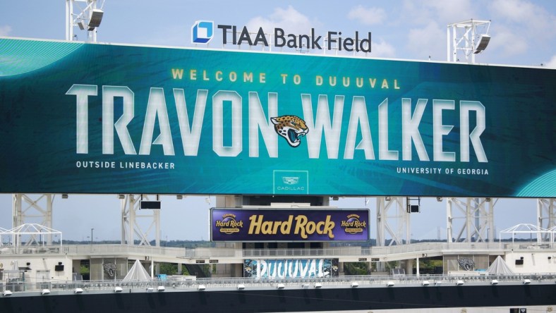 The scoreboard welcomes Jacksonville Jaguars first round draft pick Travon Walker after a press conference Friday, April 29, 2022 at TIAA Bank Field in Jacksonville. Walker, a defensive lineman from the University of Georgia, was the overall No. 1 pick for the Jacksonville Jaguars in the 2022 NFL Draft. [Corey Perrine/Florida Times-Union]

Jki 043022 No 1