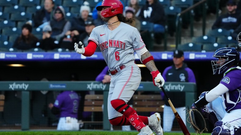 Apr 29, 2022; Denver, Colorado, USA; Cincinnati Reds second baseman Jonathan India (6) singles in the first inning against the Colorado Rockies at Coors Field. Mandatory Credit: Ron Chenoy-USA TODAY Sports